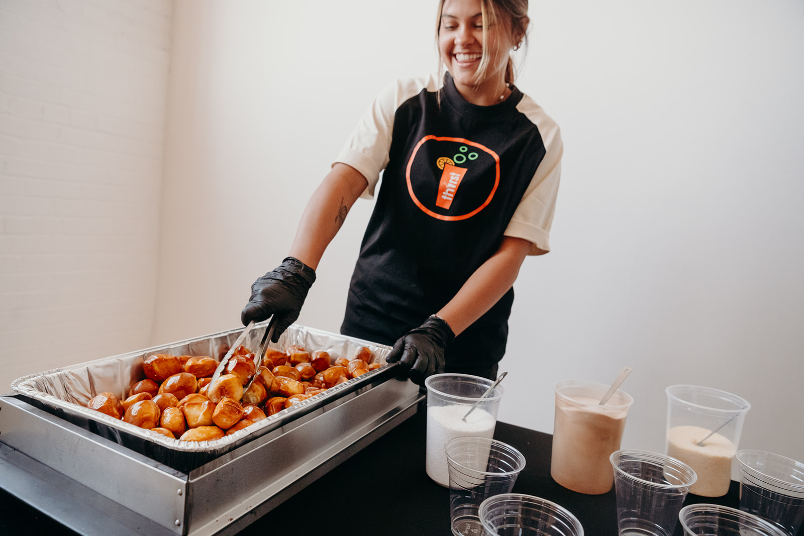 Thirst team preparing fresh pretzel bites at a catered event