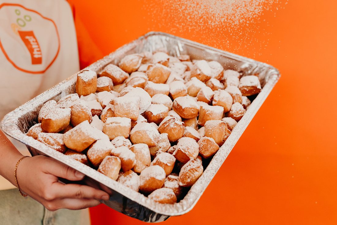 A tray of Thirst beignet bites ready for pickup or delivery
