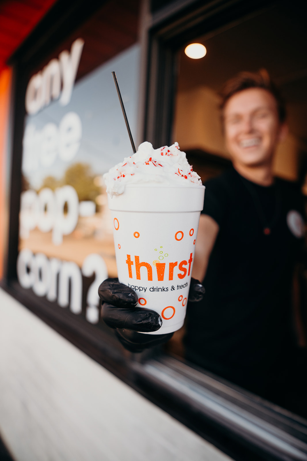 A hot chocolate handed out the drive-thru window