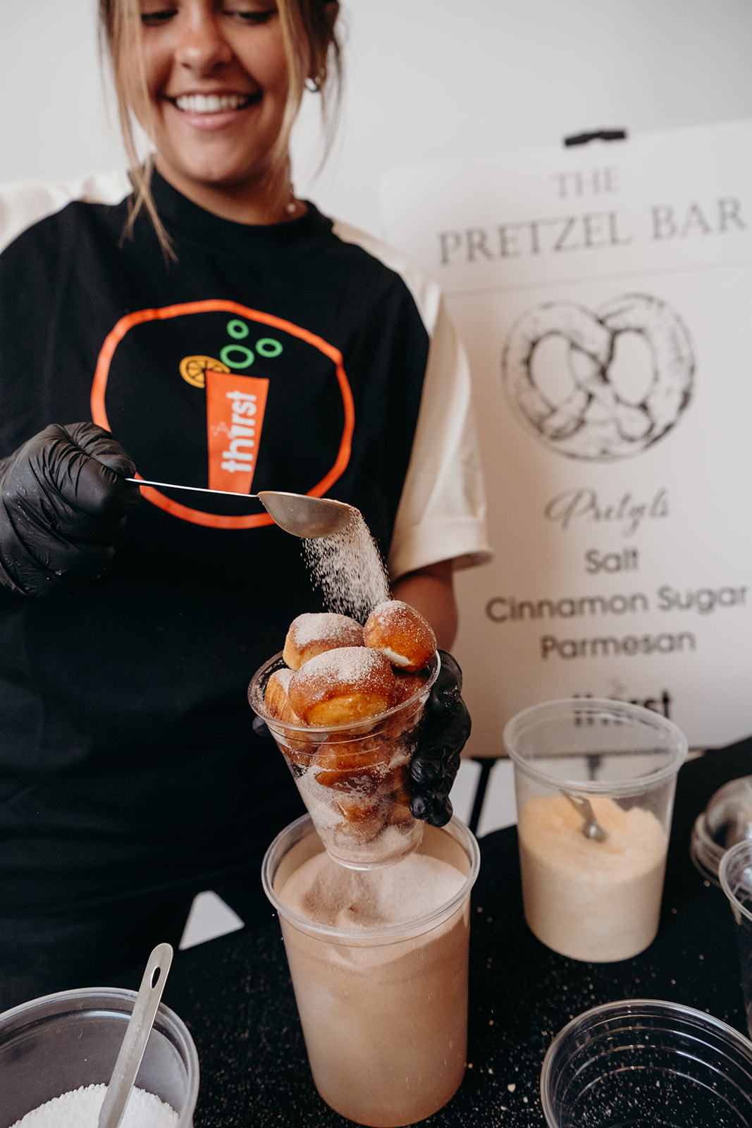 The Thirst Pretzel Bar serving warm pretzel bites at a Logan event